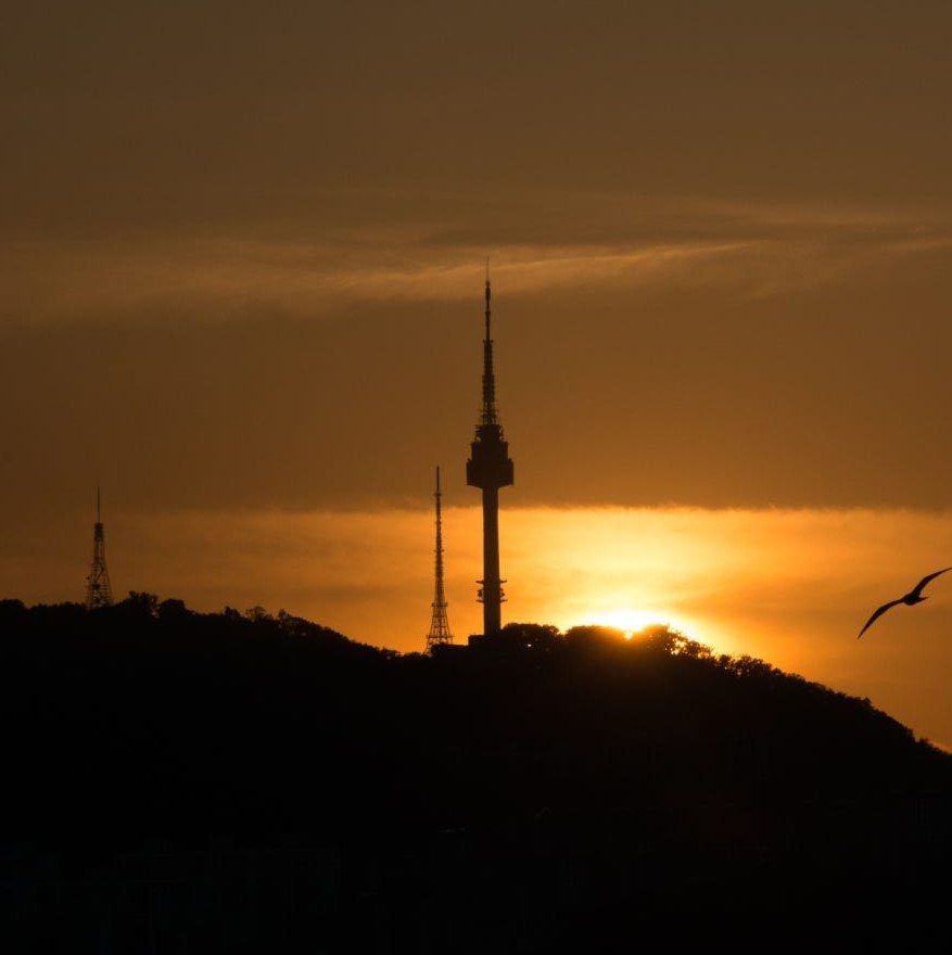 N Seoul Tower silhouetted at sunset